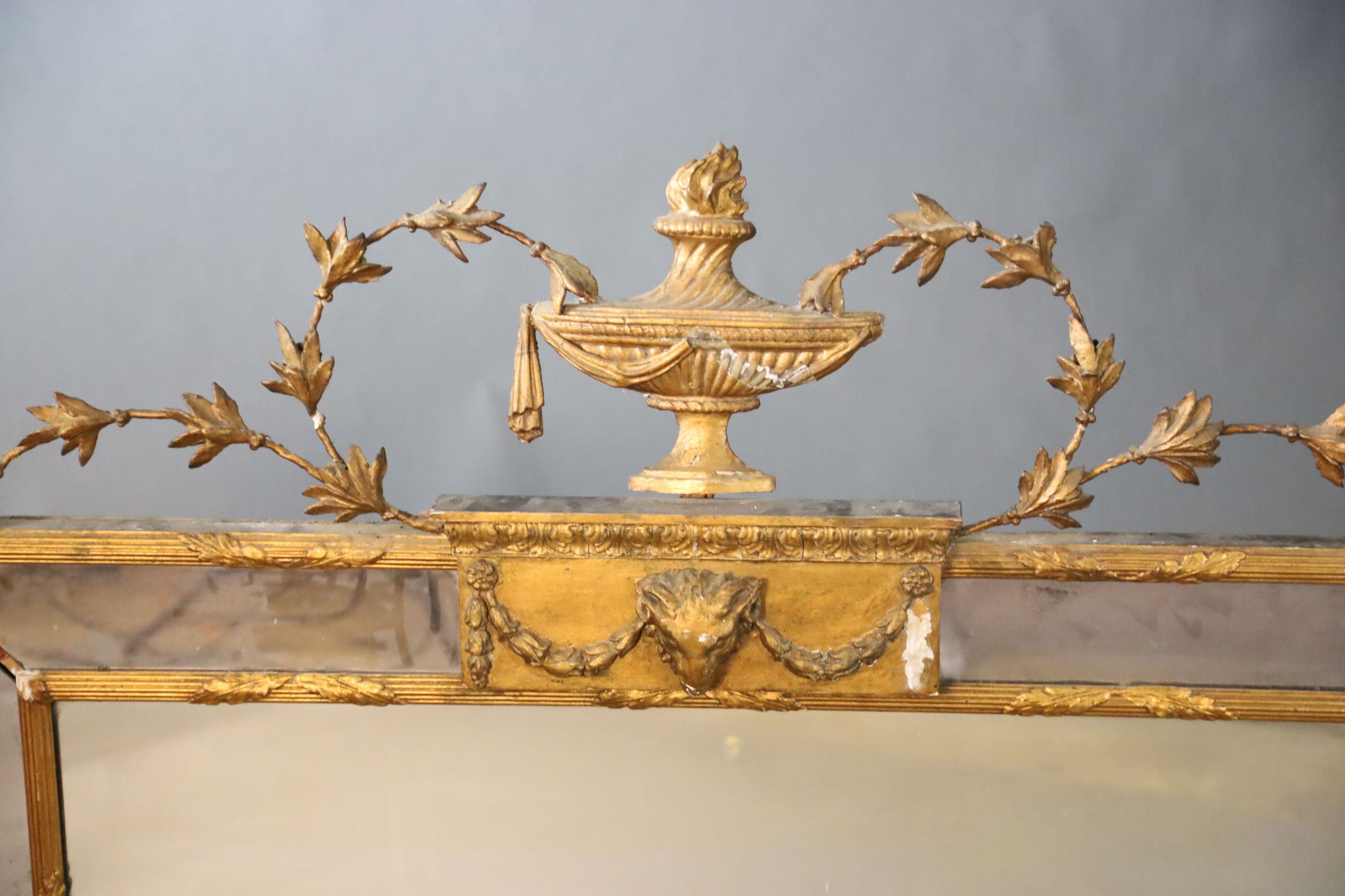 An early 20th century gilt gesso overmantel, W.137cm H.107cm